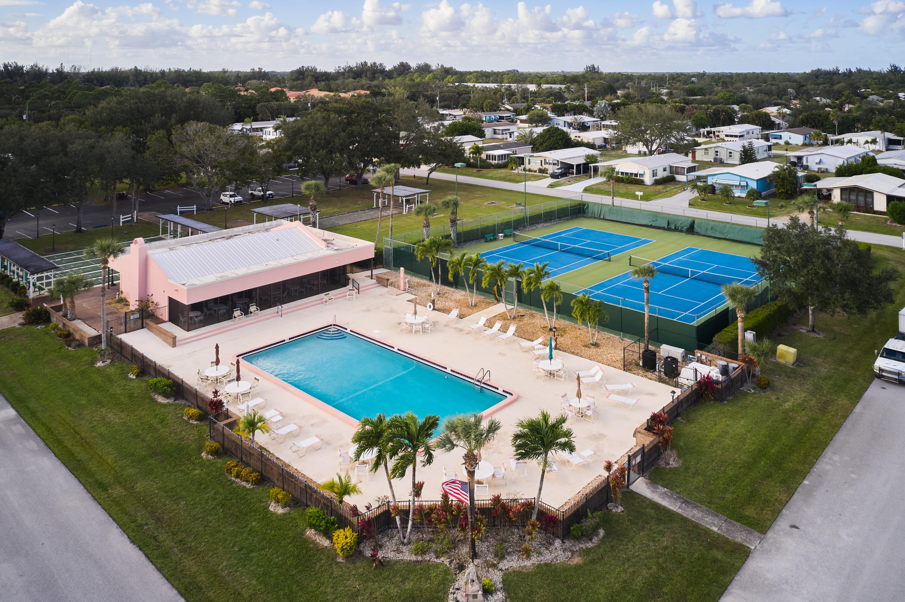 2779 Southwest Olds Place Stuart, FL 34997 - Photo 29 of 41 an aerial view of a house with a garden and lake view