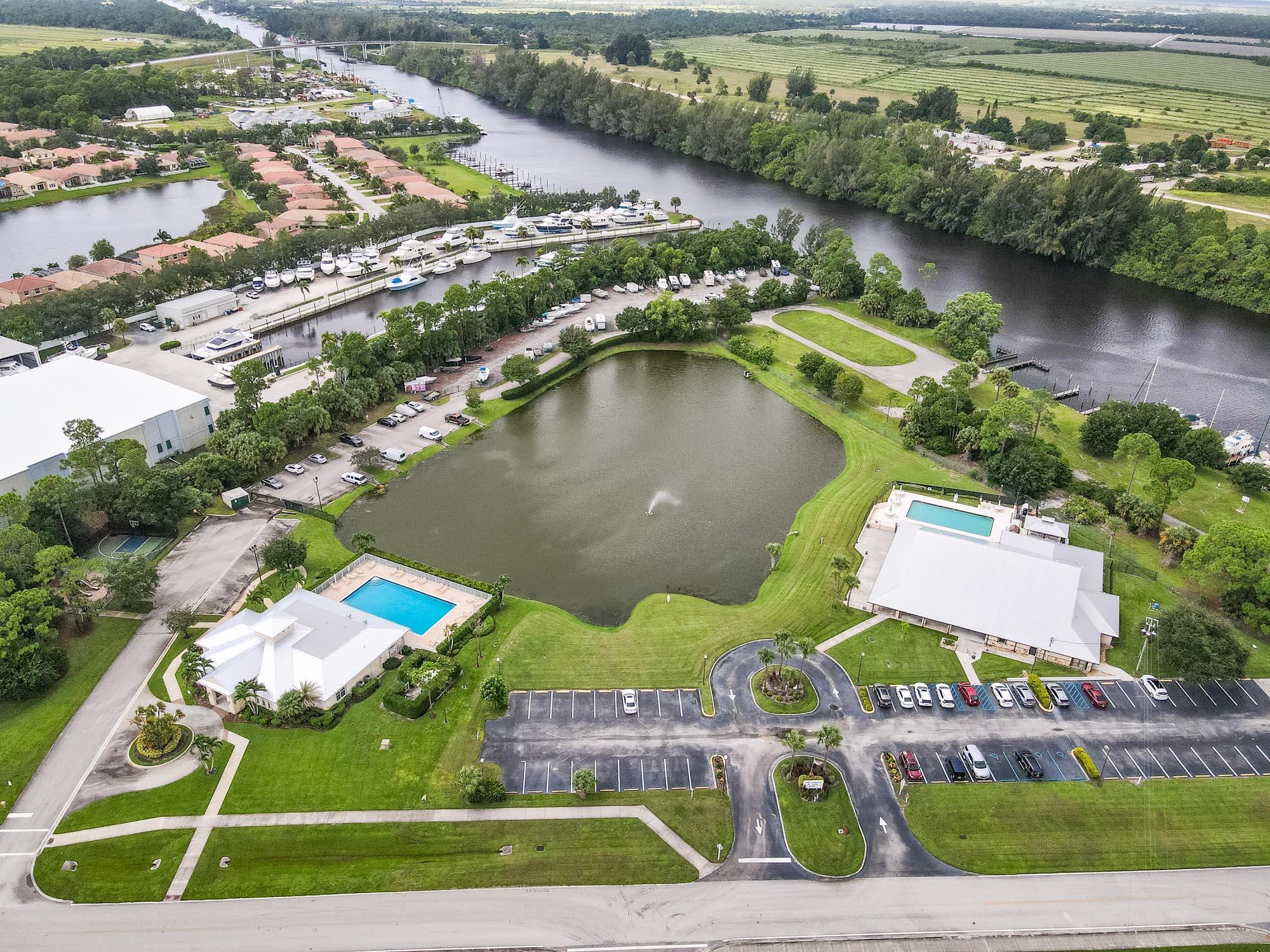 2779 Southwest Olds Place Stuart, FL 34997 - Photo 36 of 41 an aerial view of a house with a lake view