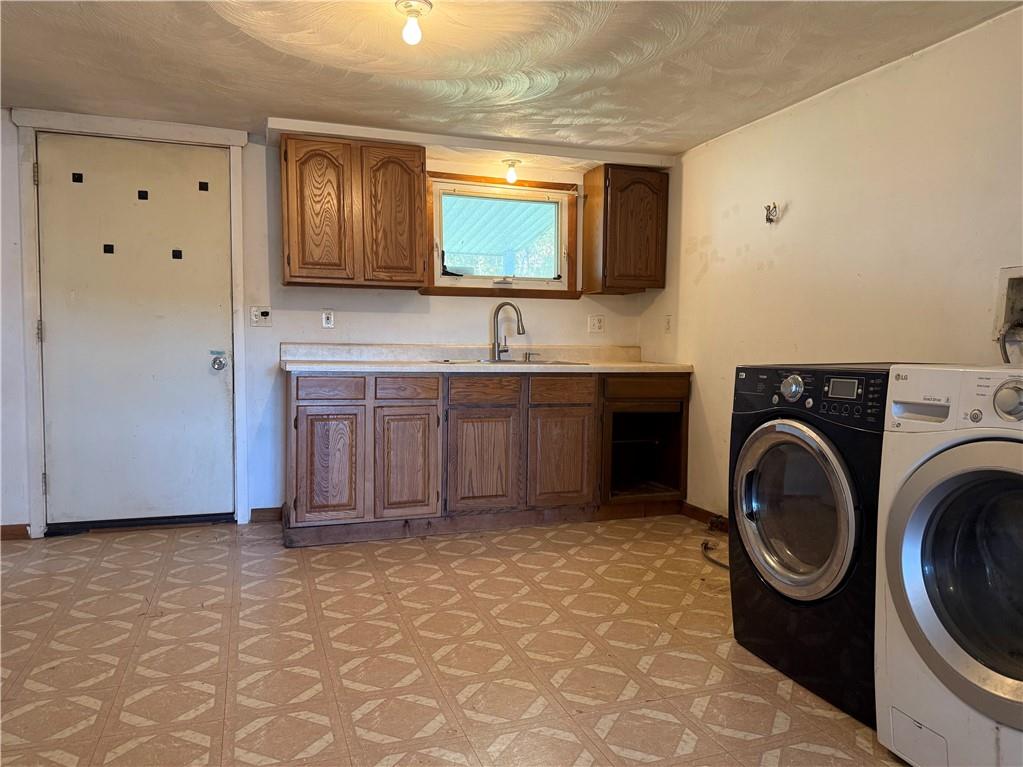 71 Beech Street Muse, PA 15350 - Photo 11 of 21 a bathroom with a sink a mirror and bathtub
