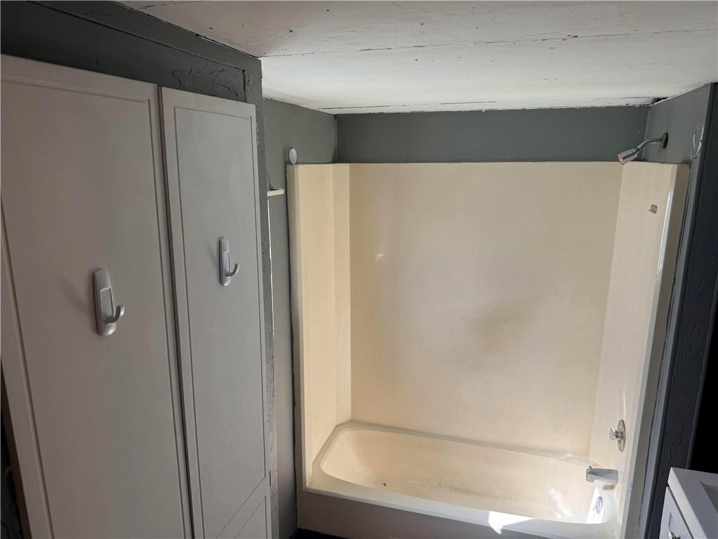 71 Beech Street Muse, PA 15350 - Photo 16 of 21 a bathroom with a glass shower door