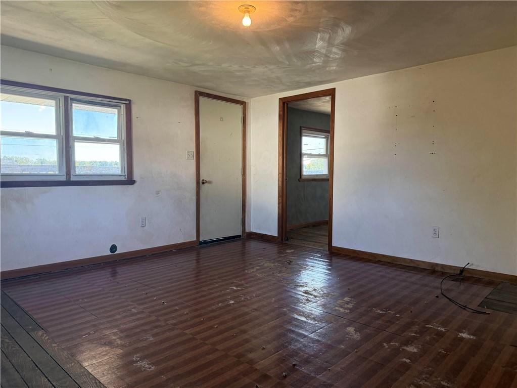 71 Beech Street Muse, PA 15350 - Photo 17 of 21 a view of an empty room with wooden floor and a window