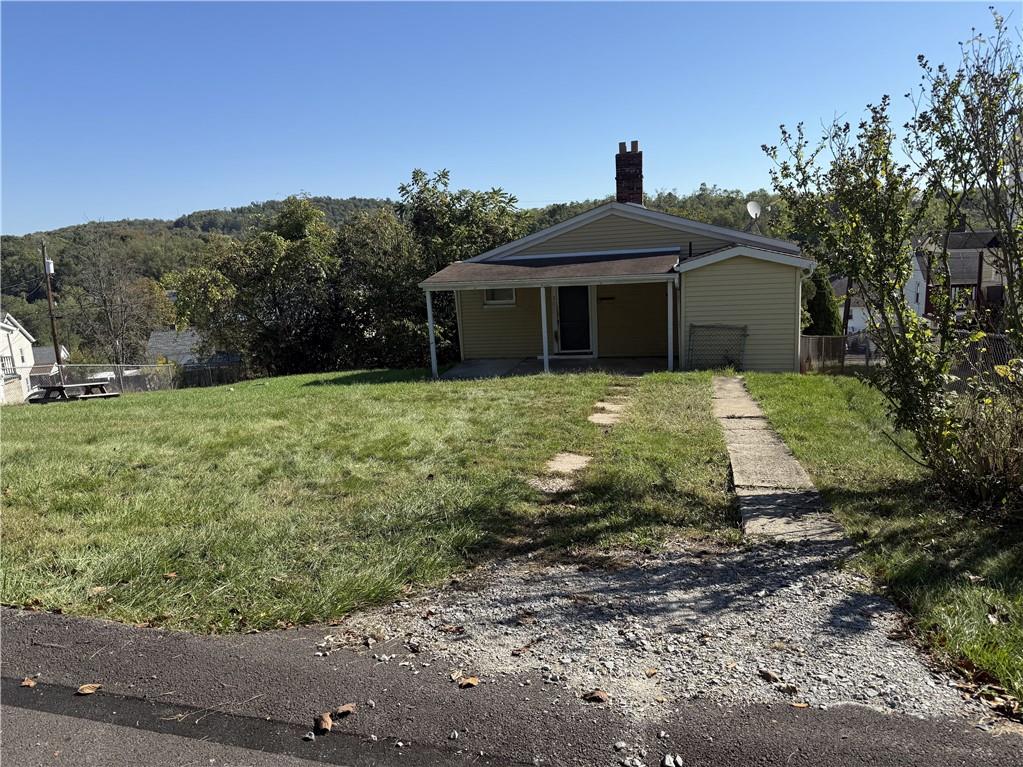 71 Beech Street Muse, PA 15350 - Photo 5 of 21 a front view of a house with a yard
