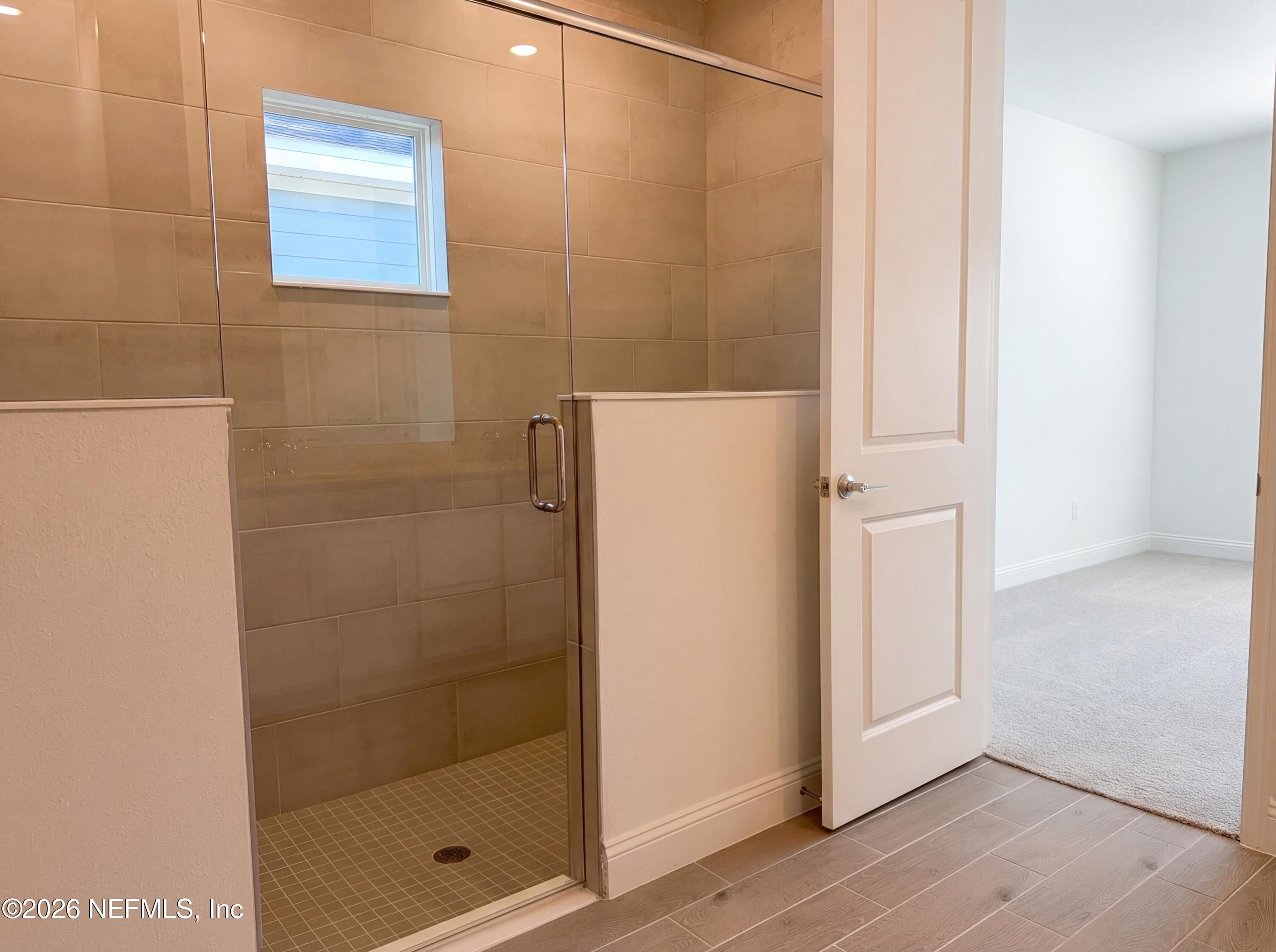 88 Round Robin St. Johns, FL 32259 - Photo 14 of 25 a bathroom with a shower