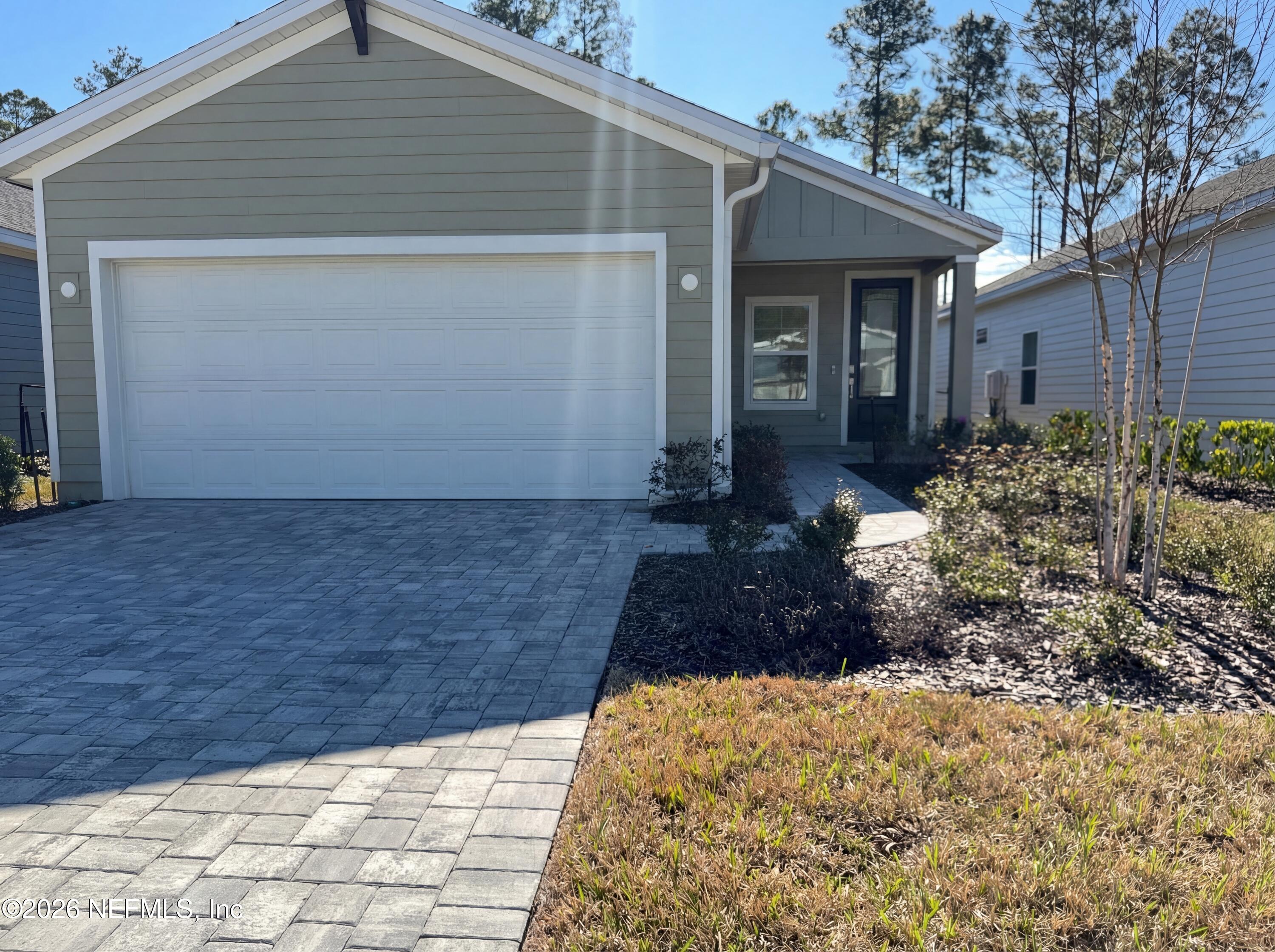 88 Round Robin St. Johns, FL 32259 - Photo 17 of 25 a view of a house with a yard