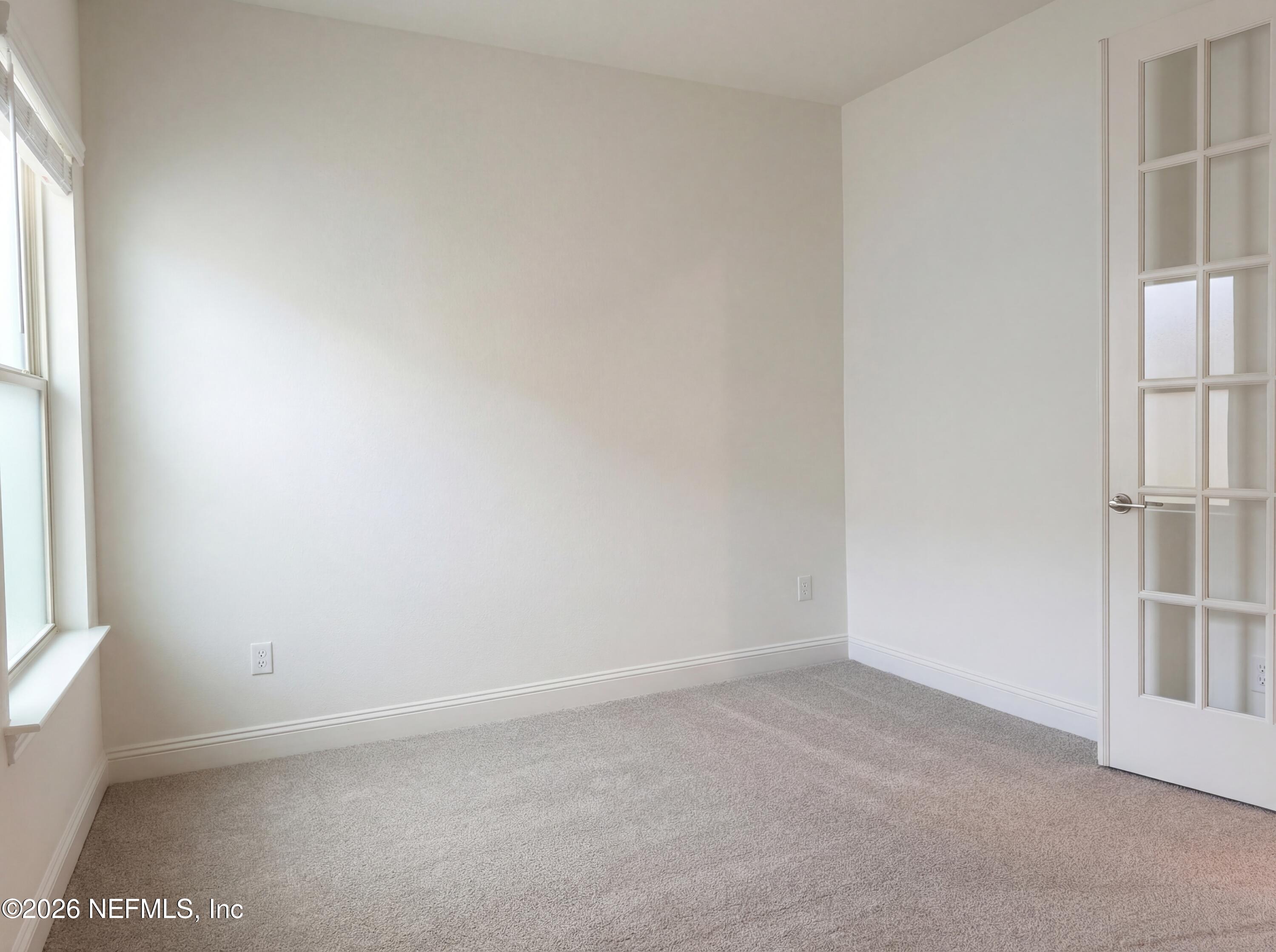 88 Round Robin St. Johns, FL 32259 - Photo 21 of 25 an empty room with windows