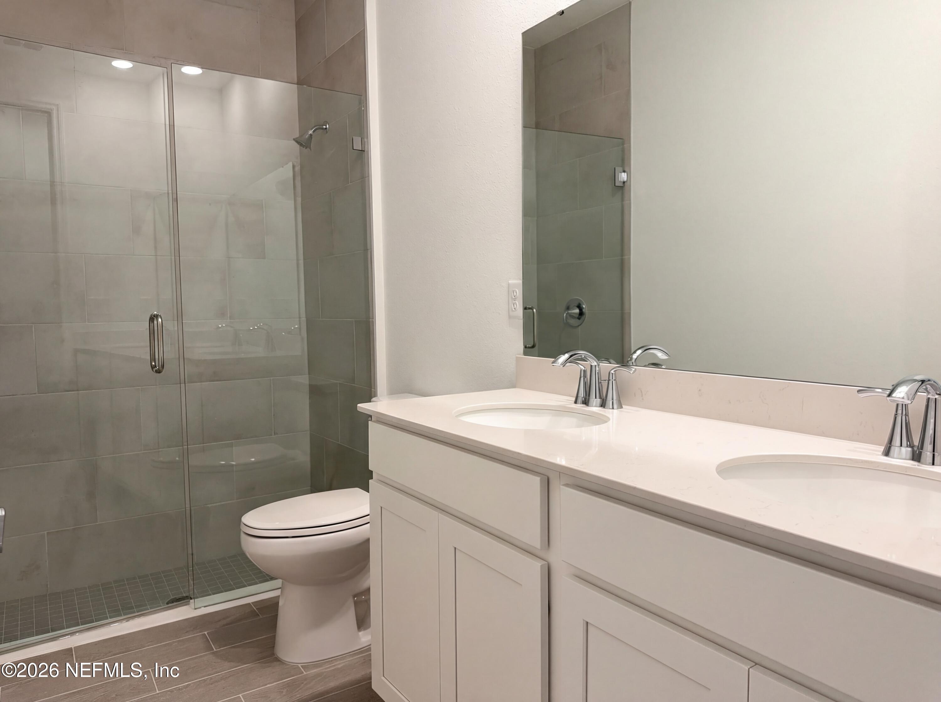 88 Round Robin St. Johns, FL 32259 - Photo 22 of 25 a bathroom with a sink toilet and shower