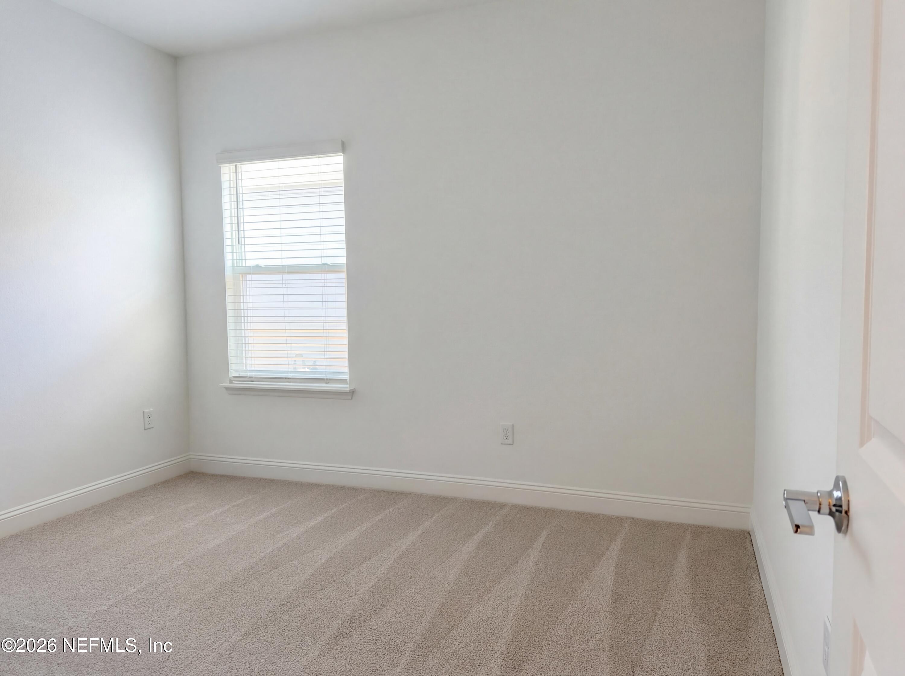 88 Round Robin St. Johns, FL 32259 - Photo 23 of 25 an empty room with a window
