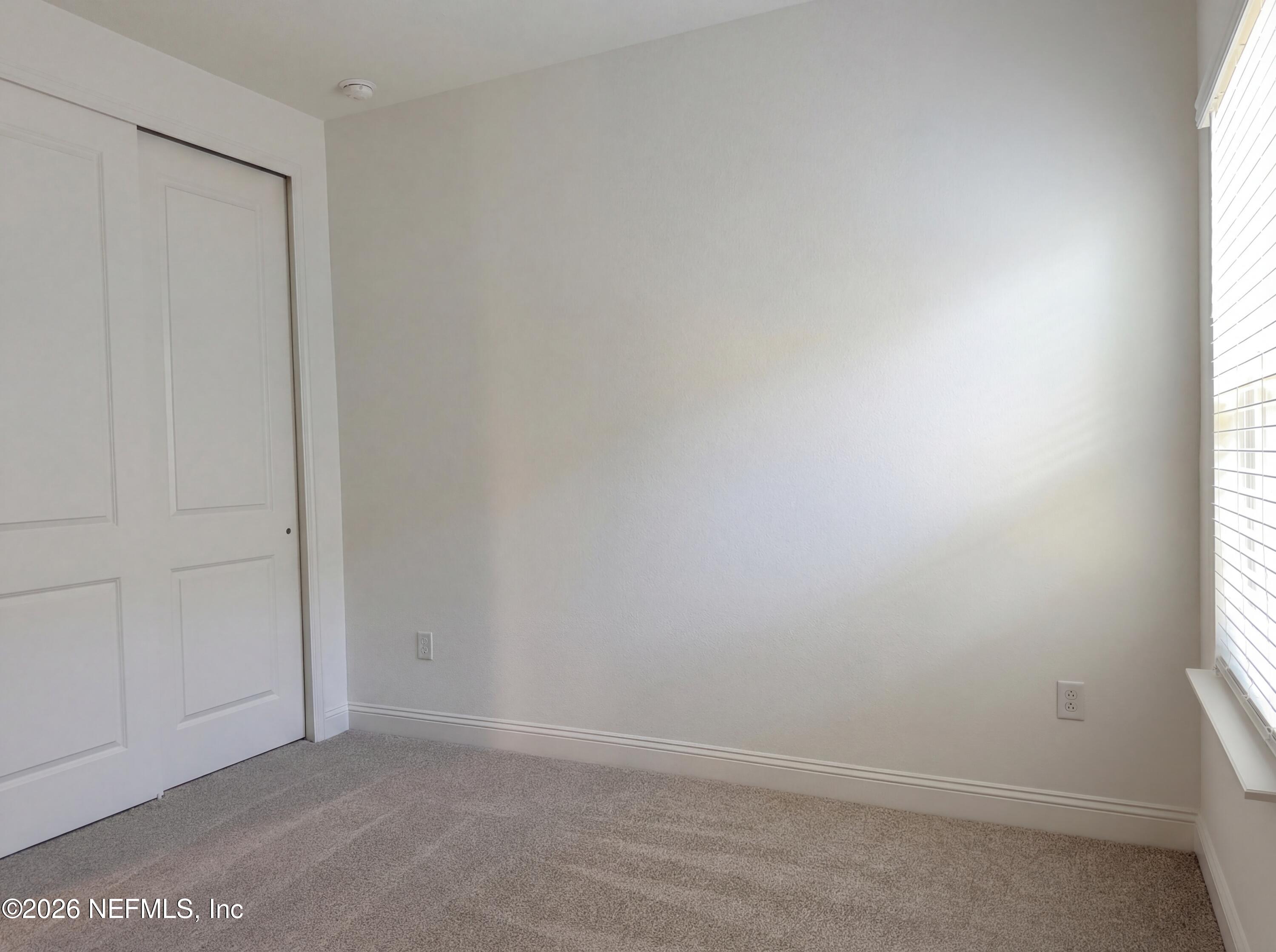88 Round Robin St. Johns, FL 32259 - Photo 24 of 25 an empty room with windows