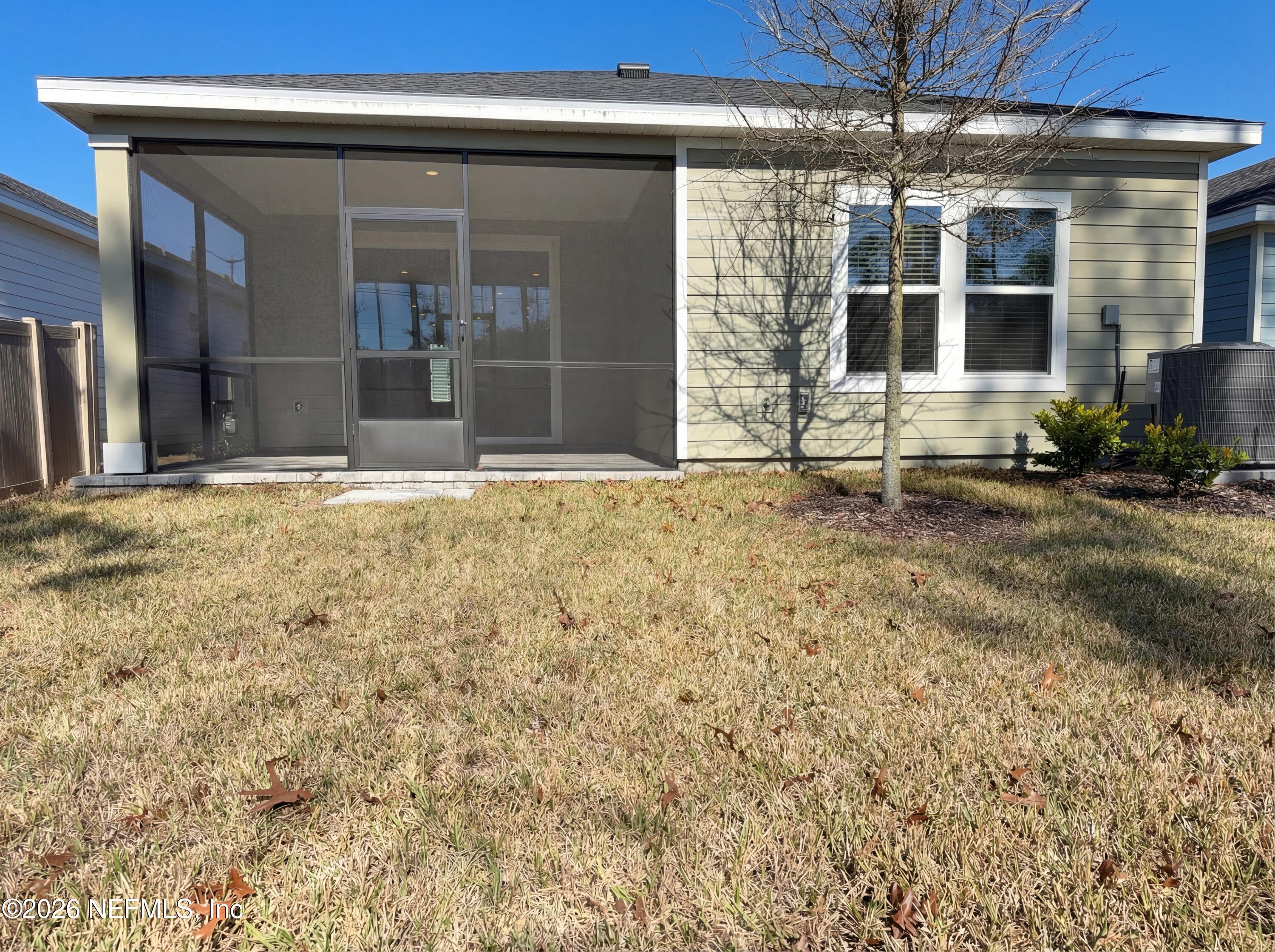 88 Round Robin St. Johns, FL 32259 - Photo 5 of 25 front view of a house with a yard