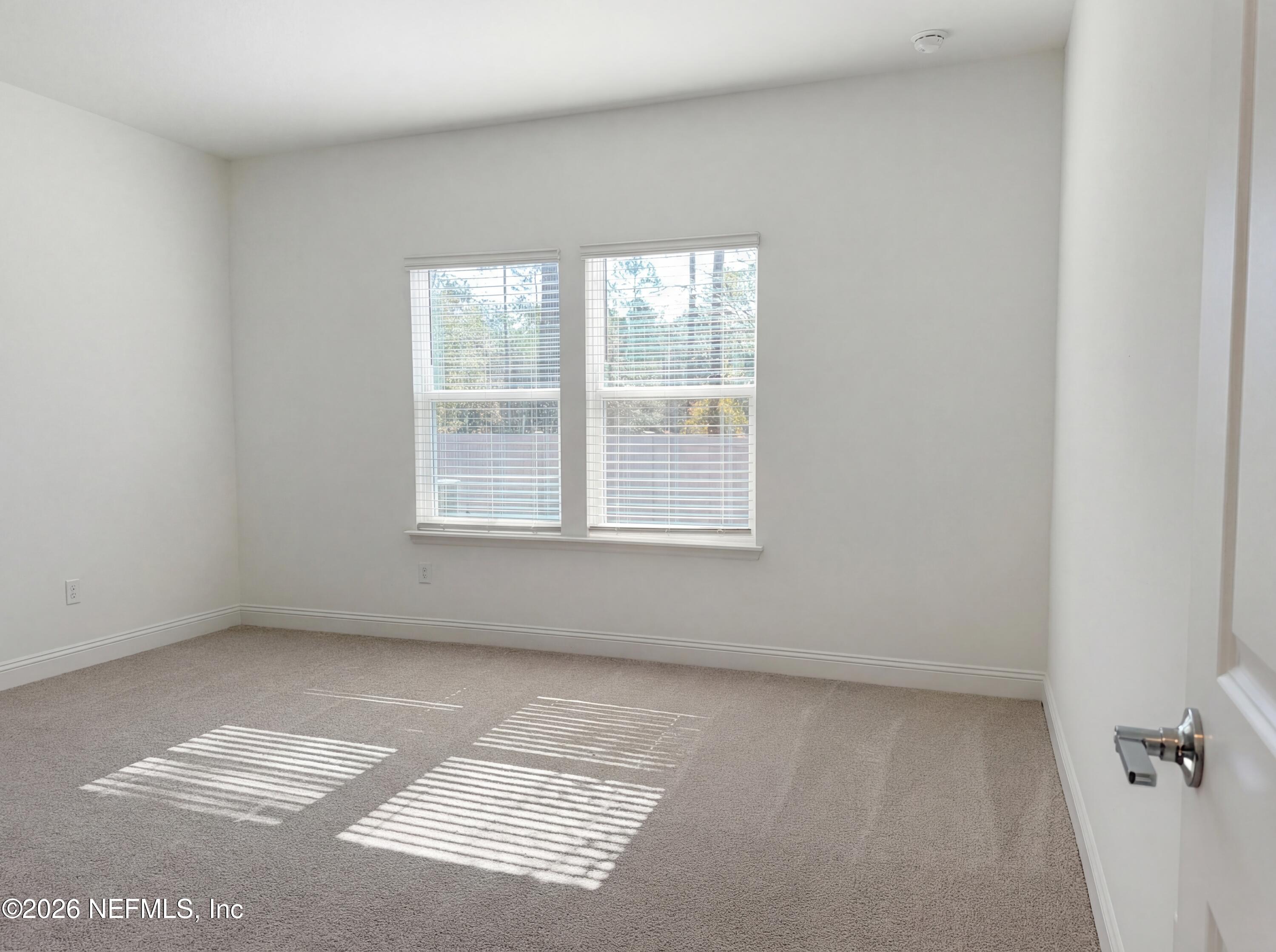 88 Round Robin St. Johns, FL 32259 - Photo 10 of 25 a view of an empty room with a window
