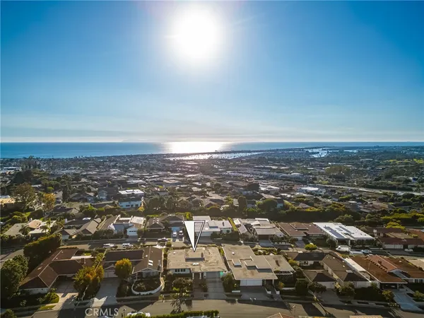 an aerial view of residential building and green space