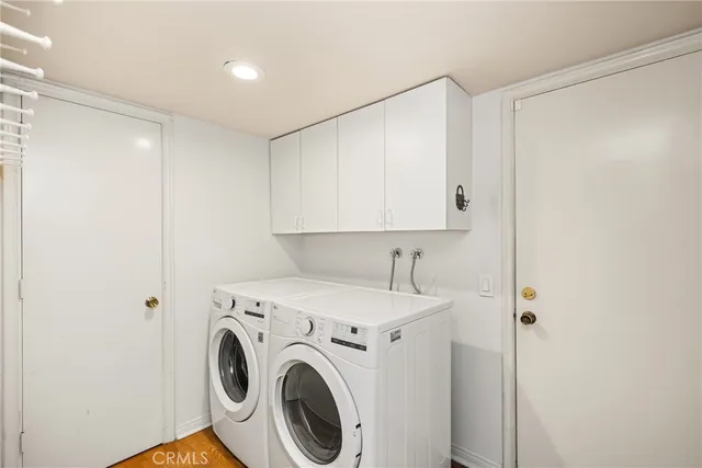 a view of a swimming pool with lounge chairs