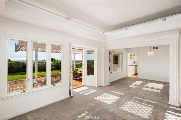 a view of a room with a large window