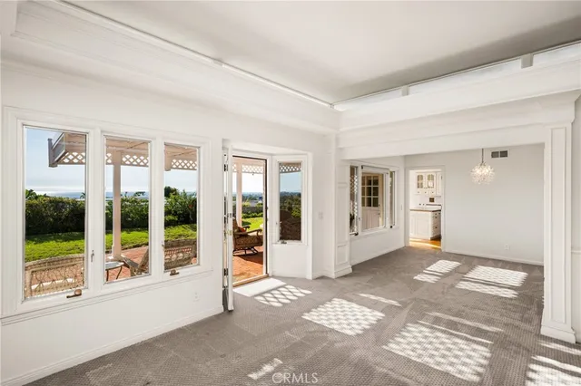 a view of a room with a large window