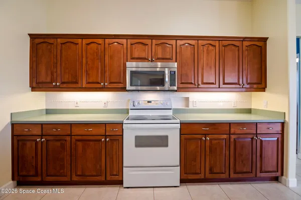 a room with furniture and a washer dryer