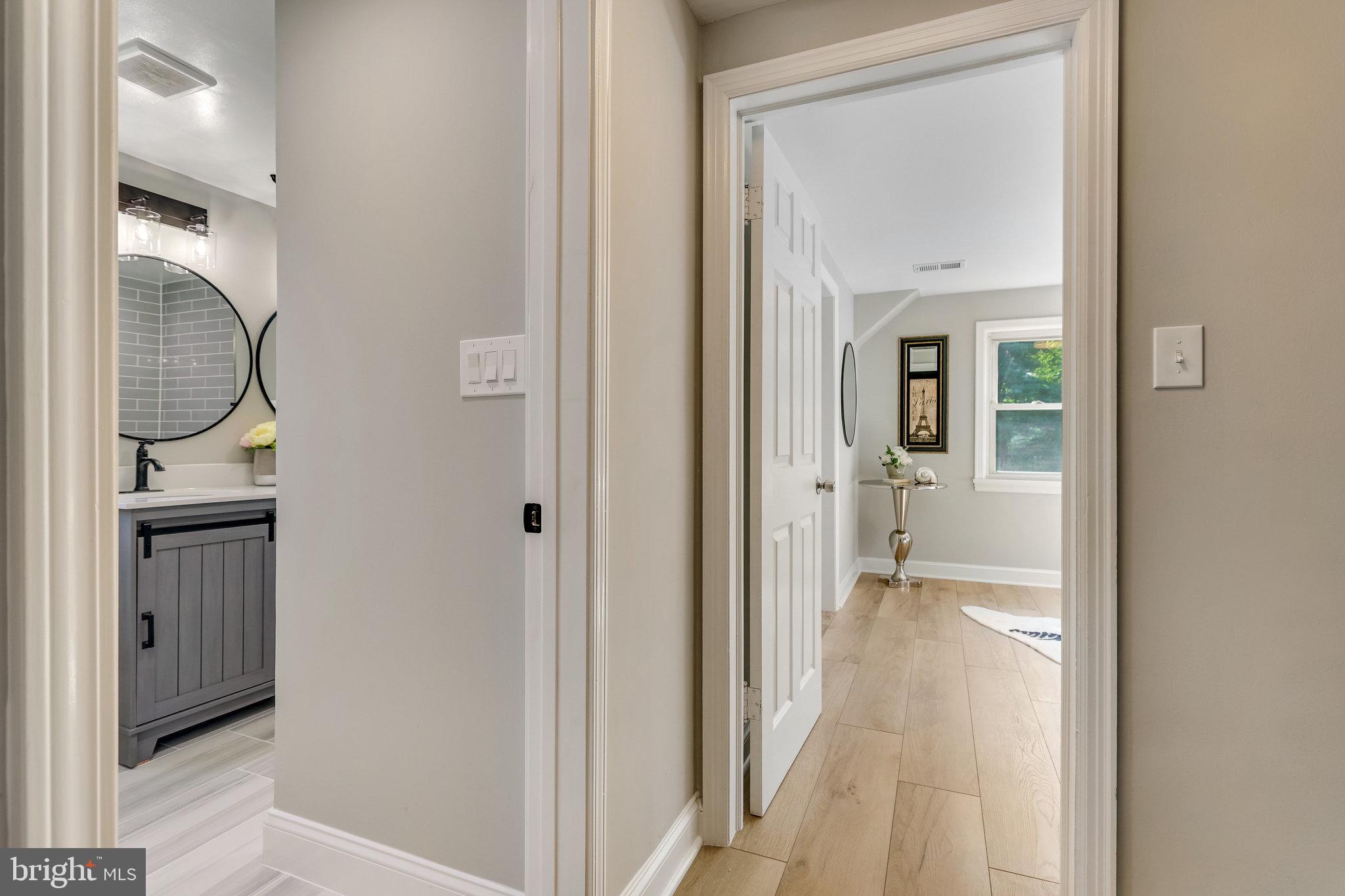 11410 Waples Mill Road Oakton, VA 22124 - Photo 41 of 62 Charming hallway with modern touches.