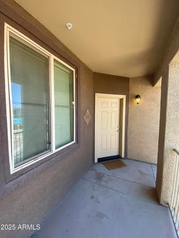 an empty room with closet area