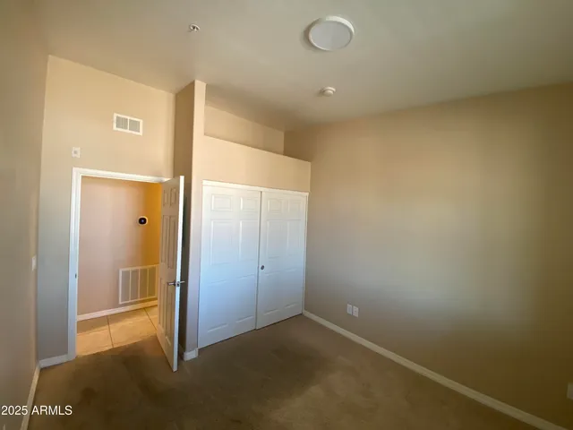 a bathroom with a sink toilet and mirror