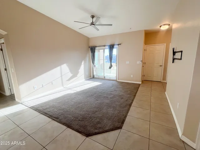 a view of a hallway with a chandelier