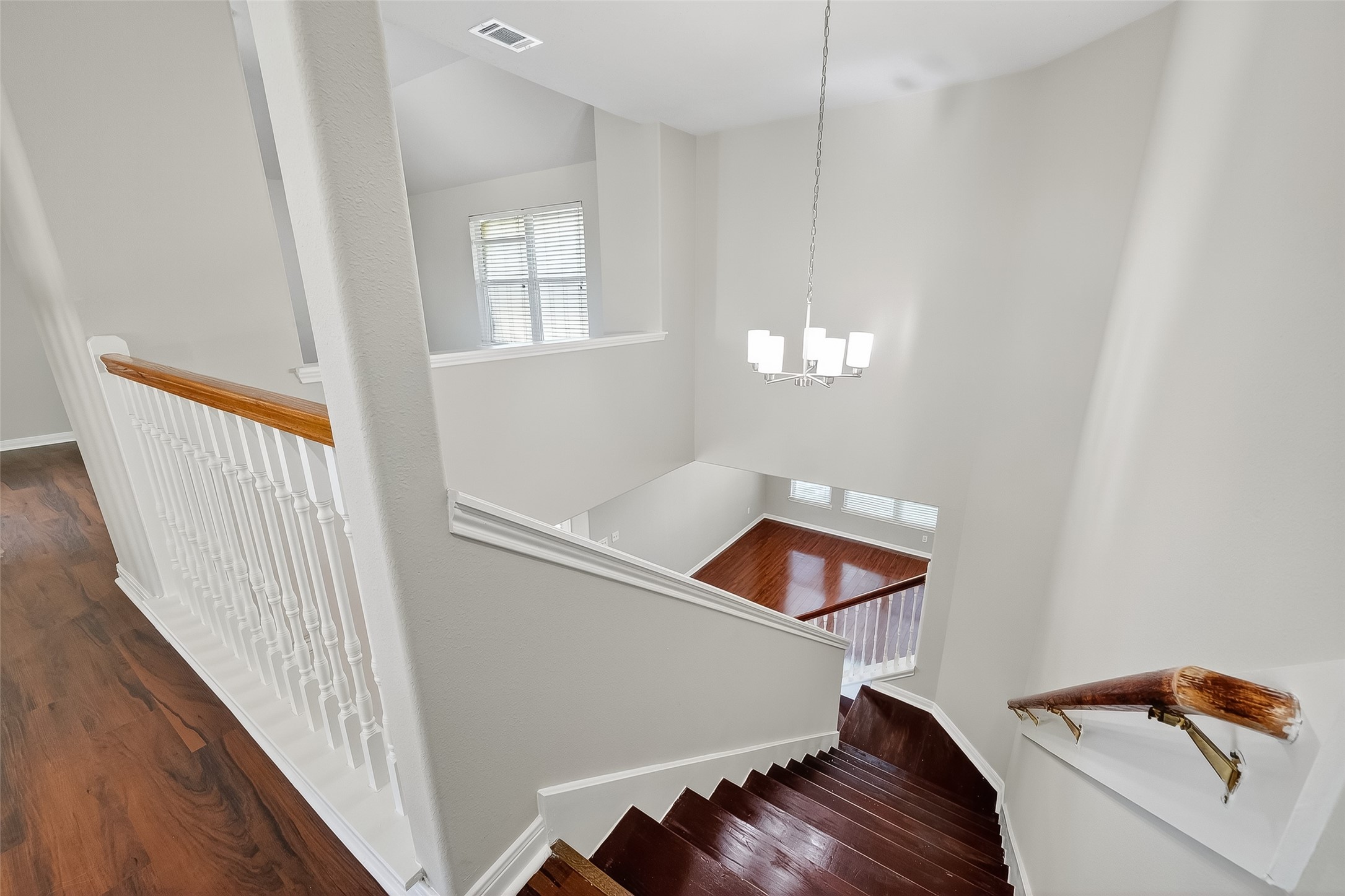 6506 Rose Willow Lane Spring, TX 77379 - Photo 14 of 38 a view of an empty room with wooden floor and a window