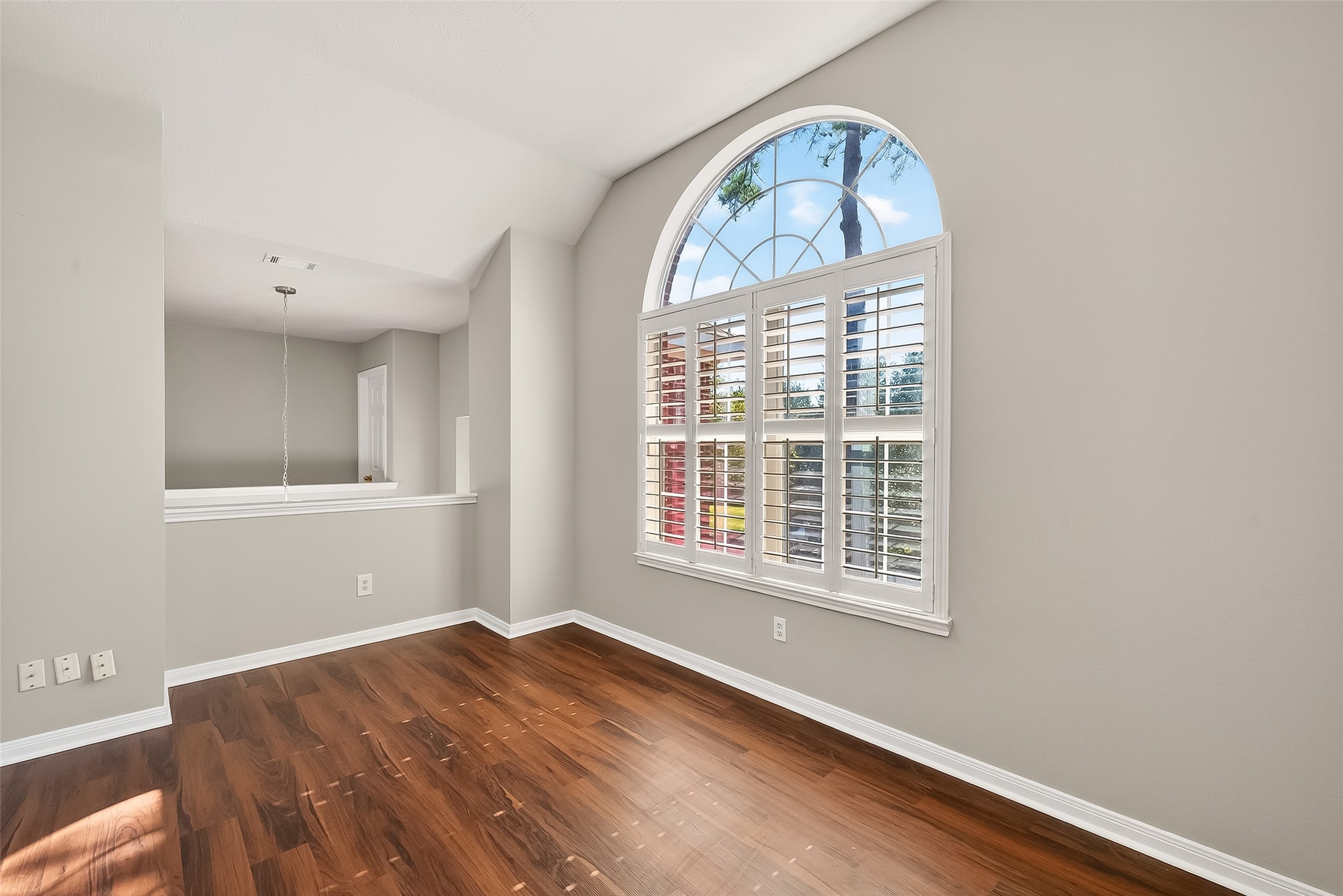 6506 Rose Willow Lane Spring, TX 77379 - Photo 19 of 38 a view of empty room with wooden floor and fan