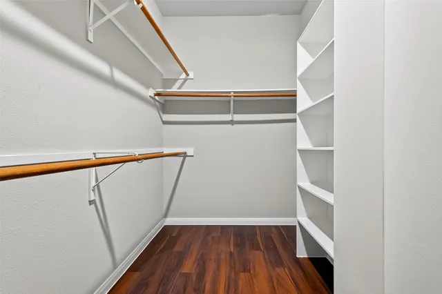 a white bath tub sitting next to a window