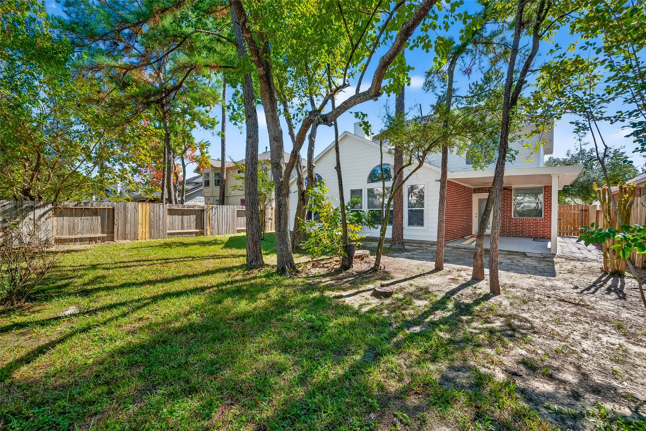 6506 Rose Willow Lane Spring, TX 77379 - Photo 35 of 38 a view of a house with a yard