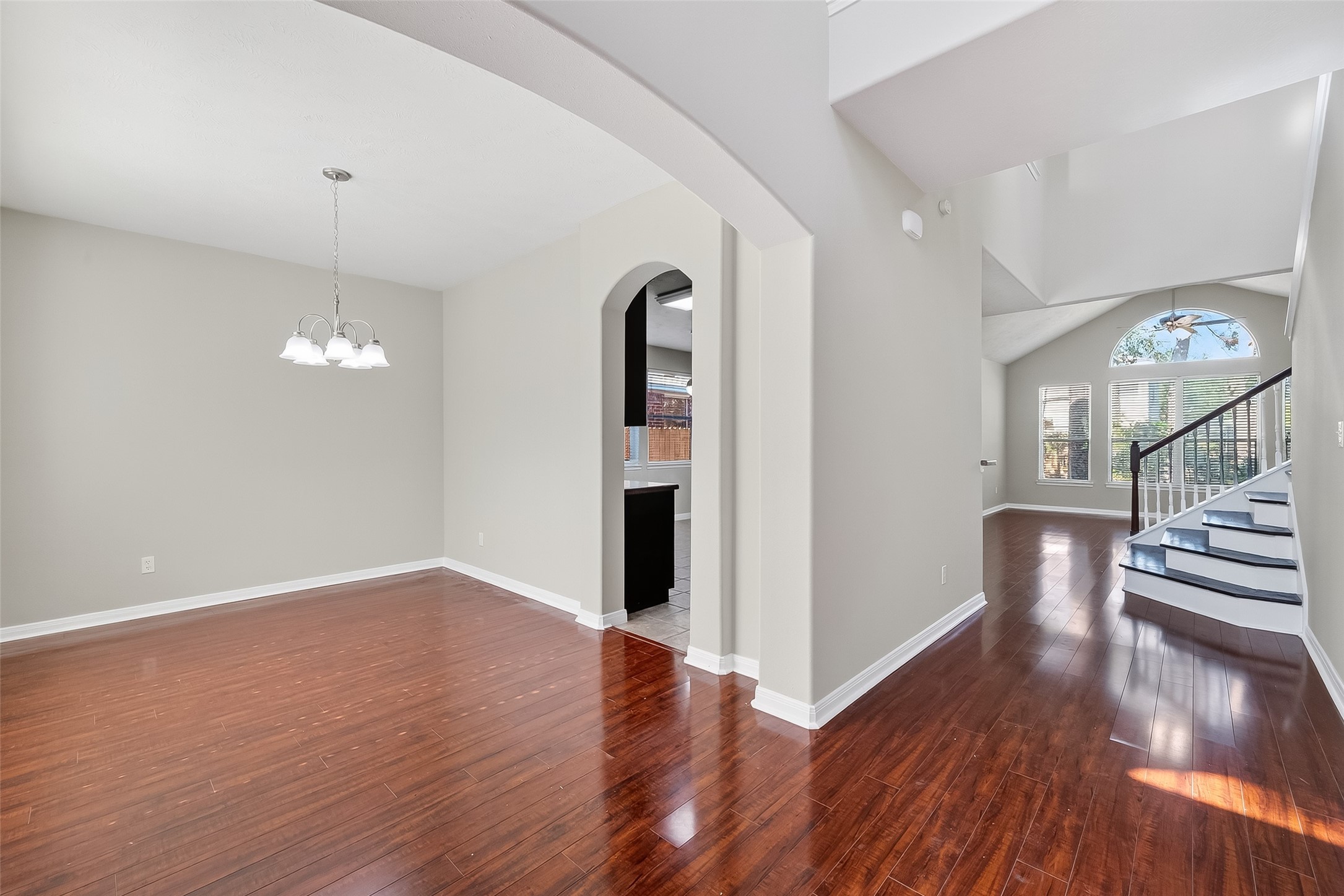 6506 Rose Willow Lane Spring, TX 77379 - Photo 4 of 38 wooden floor in an empty room with a window