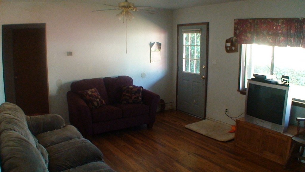 1077 Harpole Road Redding, CA 96002 - Photo 8 of 8 a living room with furniture and a window