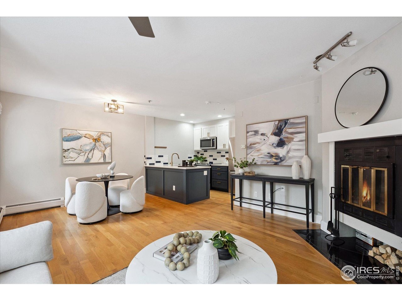 2201 Pearl Street, Unit 2 Boulder, CO 80302 - Photo 11 of 37 a living room with furniture a pool table and a fireplace
