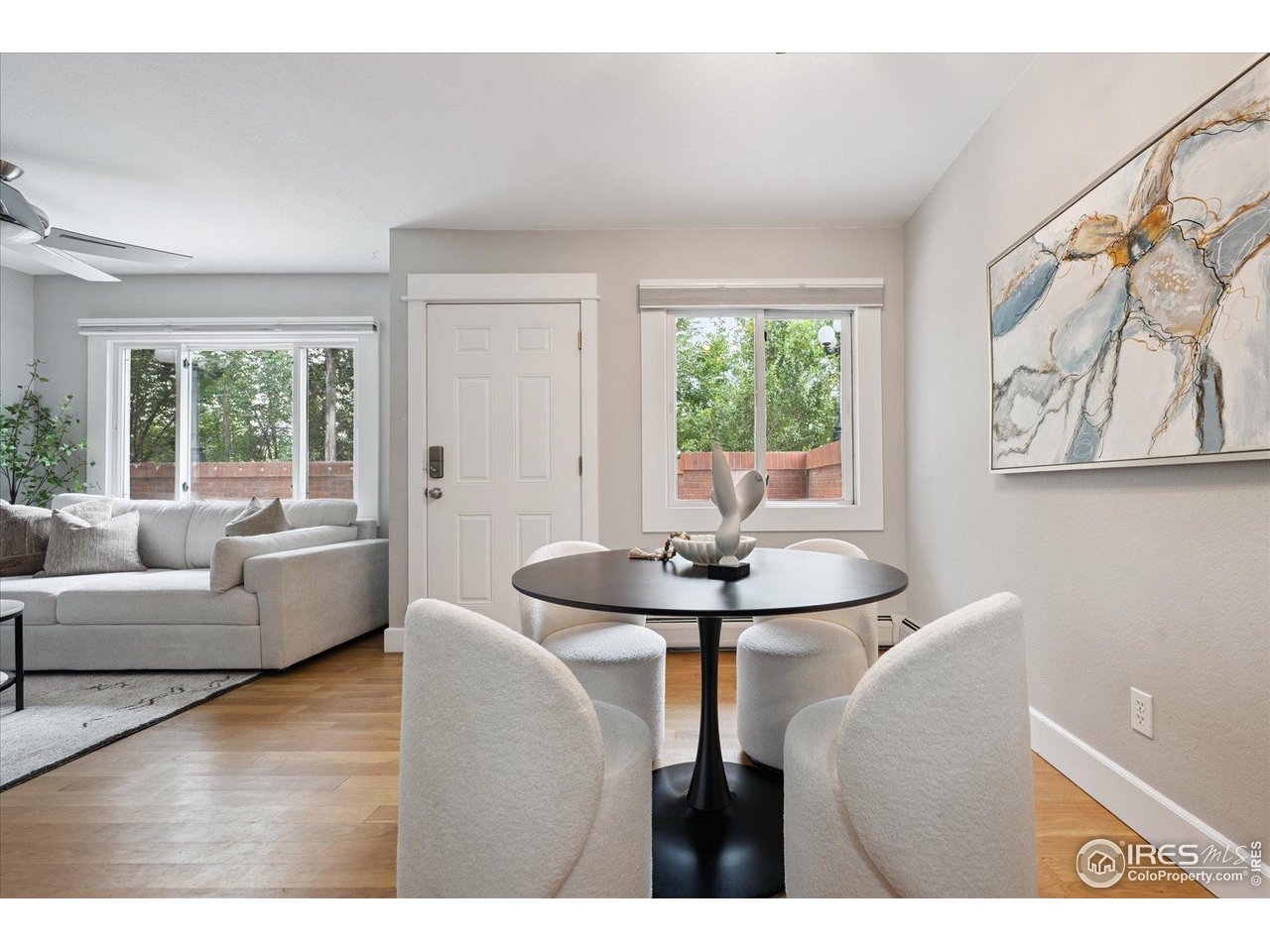 2201 Pearl Street, Unit 2 Boulder, CO 80302 - Photo 12 of 37 a view of a dining room with furniture and window