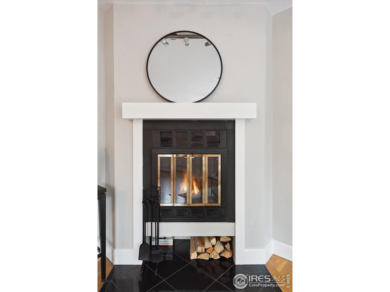 2201 Pearl Street, Unit 2 Boulder, CO 80302 - Photo 14 of 37 a view of a livingroom with furniture and a fireplace