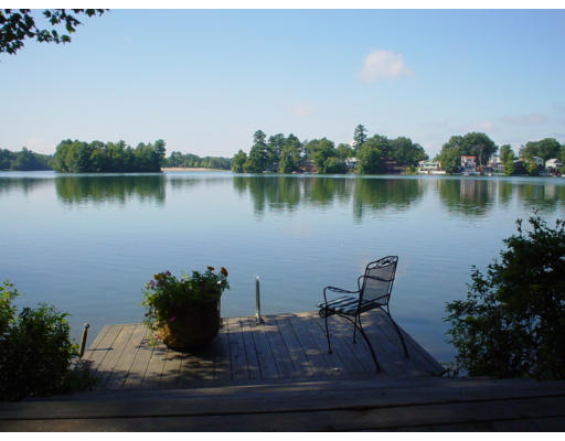 26 Freyer Road Southampton, MA 01073 - Photo 5 of 5 a view of a lake with a table and chairs