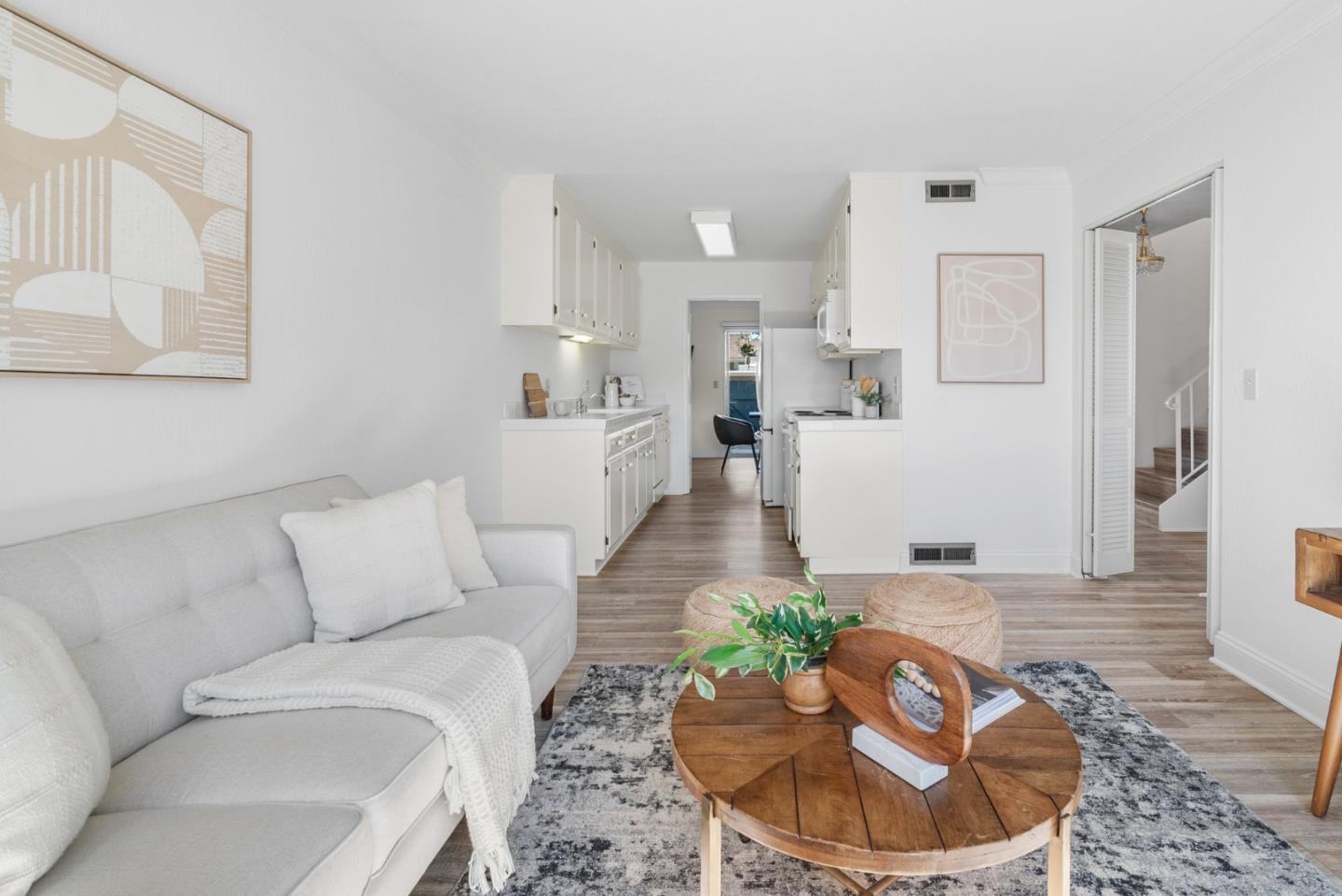 120 Paseo Ballena Aptos, CA 95003 - Photo 11 of 69 a living room with furniture and a wooden floor