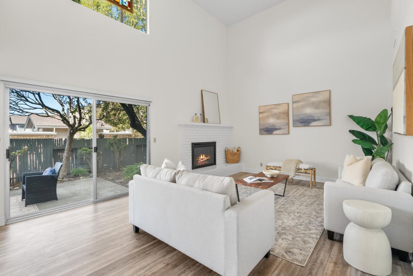 120 Paseo Ballena Aptos, CA 95003 - Photo 24 of 69 a living room with furniture and a large window