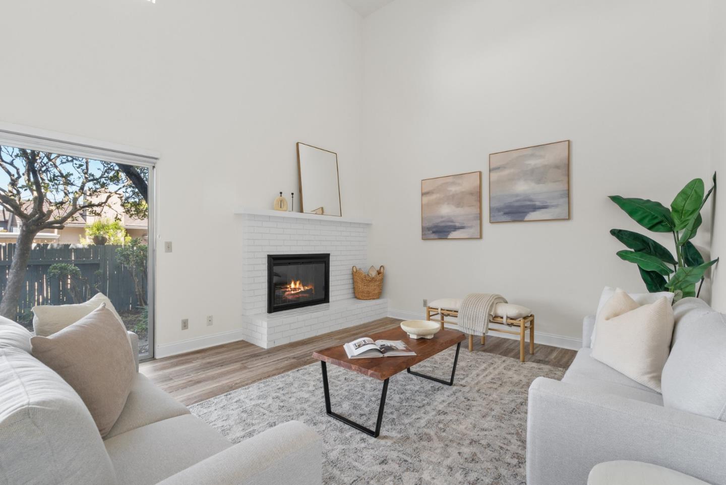 120 Paseo Ballena Aptos, CA 95003 - Photo 25 of 69 a living room with furniture and a fireplace