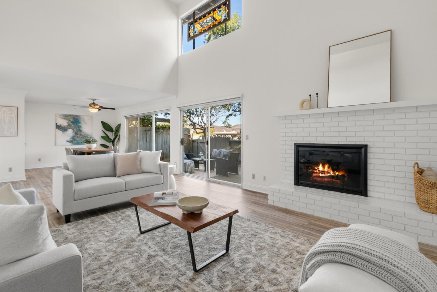 120 Paseo Ballena Aptos, CA 95003 - Photo 30 of 69 a living room with furniture and a fireplace