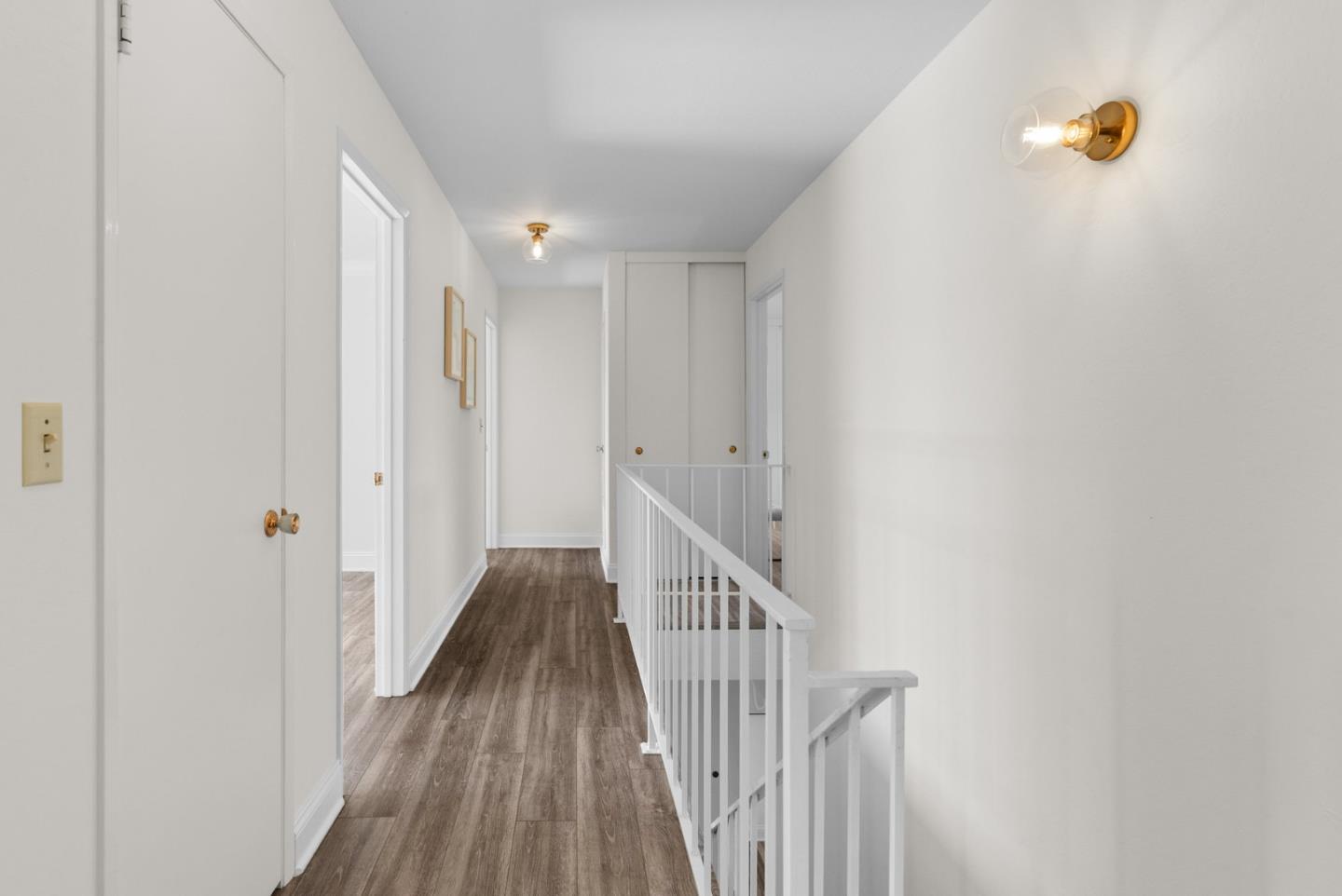 120 Paseo Ballena Aptos, CA 95003 - Photo 36 of 69 a view of a hallway with wooden floor