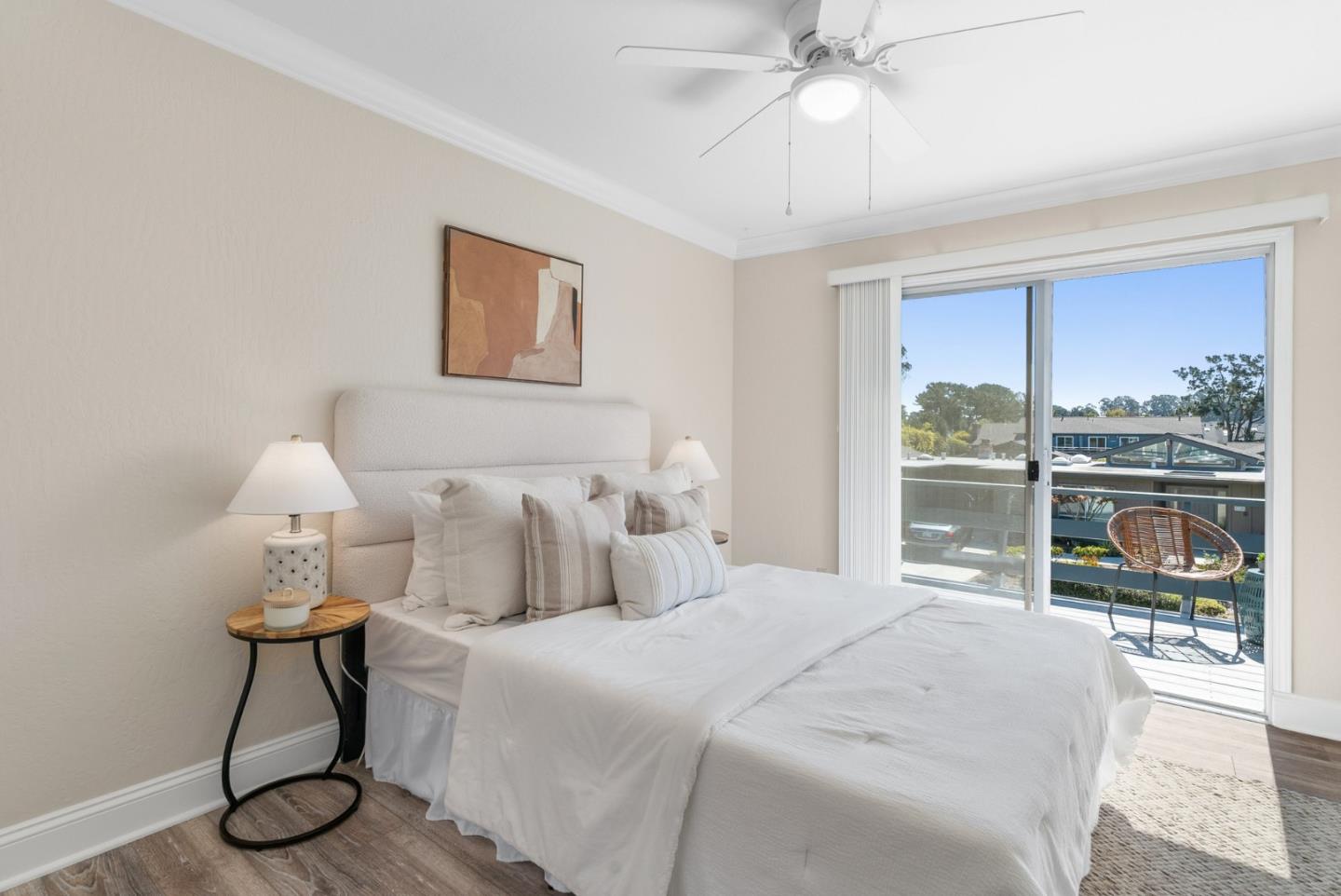 120 Paseo Ballena Aptos, CA 95003 - Photo 37 of 69 a bedroom with a balcony a bed and a chandelier