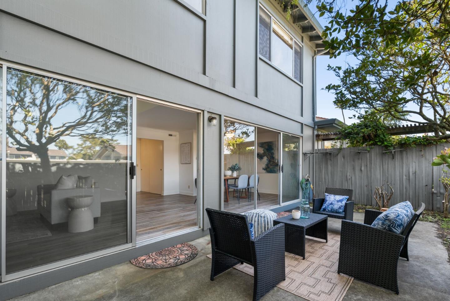 120 Paseo Ballena Aptos, CA 95003 - Photo 58 of 69 a view of a patio with couches table and chairs and potted plants