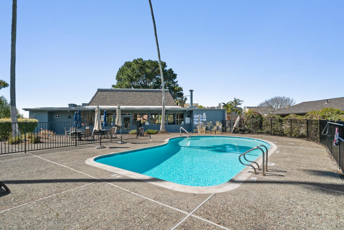 120 Paseo Ballena Aptos, CA 95003 - Photo 61 of 69 a view of a swimming pool with lounge chairs