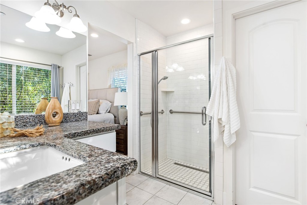 1671 Joshua Tree Lane Fallbrook, CA 92028 - Photo 25 of 44 a living room with stainless steel appliances granite countertop furniture and a fireplace