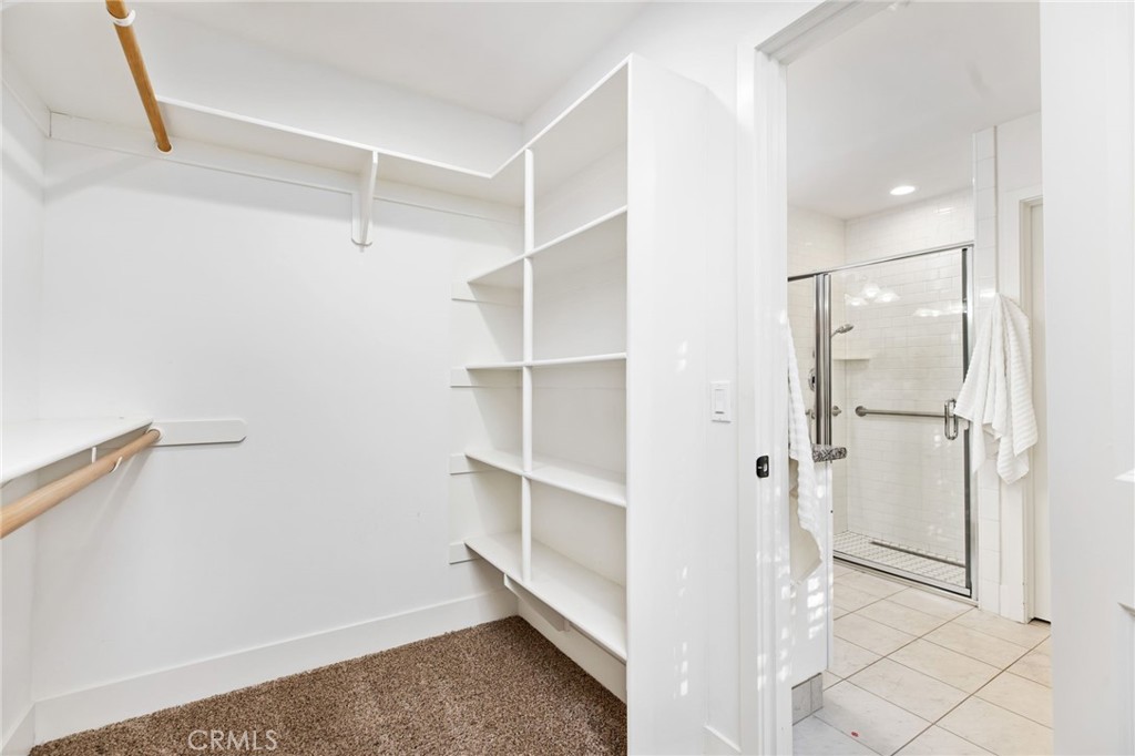 1671 Joshua Tree Lane Fallbrook, CA 92028 - Photo 26 of 44 a view of an empty walk in closet