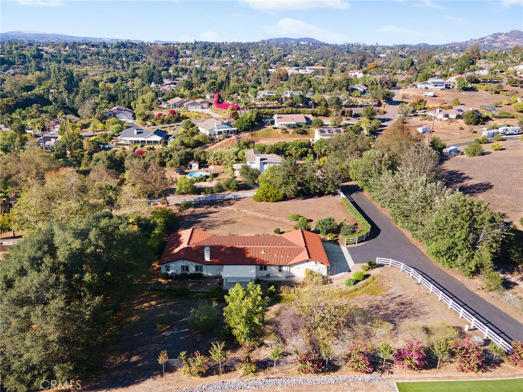 1671 Joshua Tree Lane Fallbrook, CA 92028 - Photo 35 of 44 an aerial view of a house with a garden