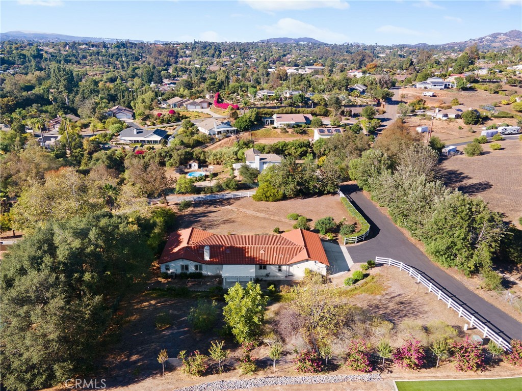 1671 Joshua Tree Lane Fallbrook, CA 92028 - Photo 41 of 44 an aerial view of a house with a garden