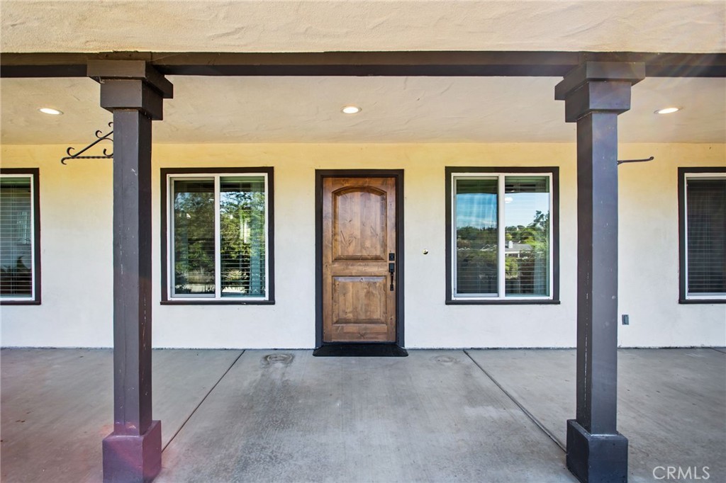 1671 Joshua Tree Lane Fallbrook, CA 92028 - Photo 7 of 44 an empty room with windows