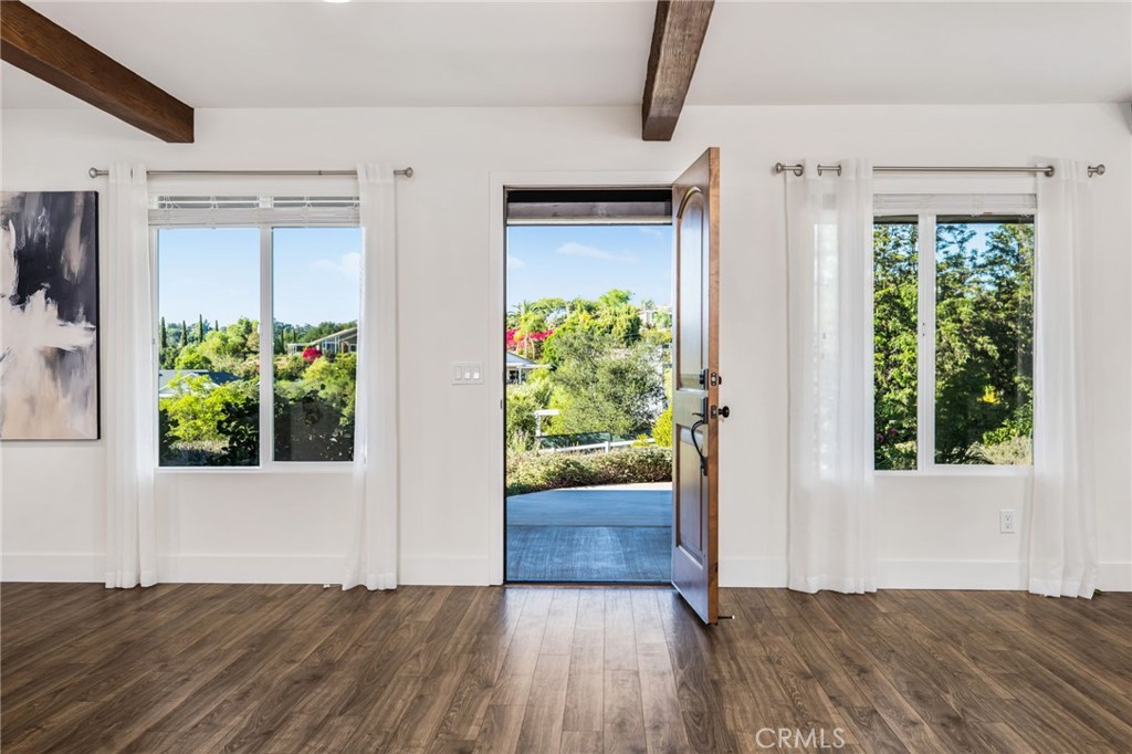 1671 Joshua Tree Lane Fallbrook, CA 92028 - Photo 10 of 44 a view of an entryway with wooden floor and door