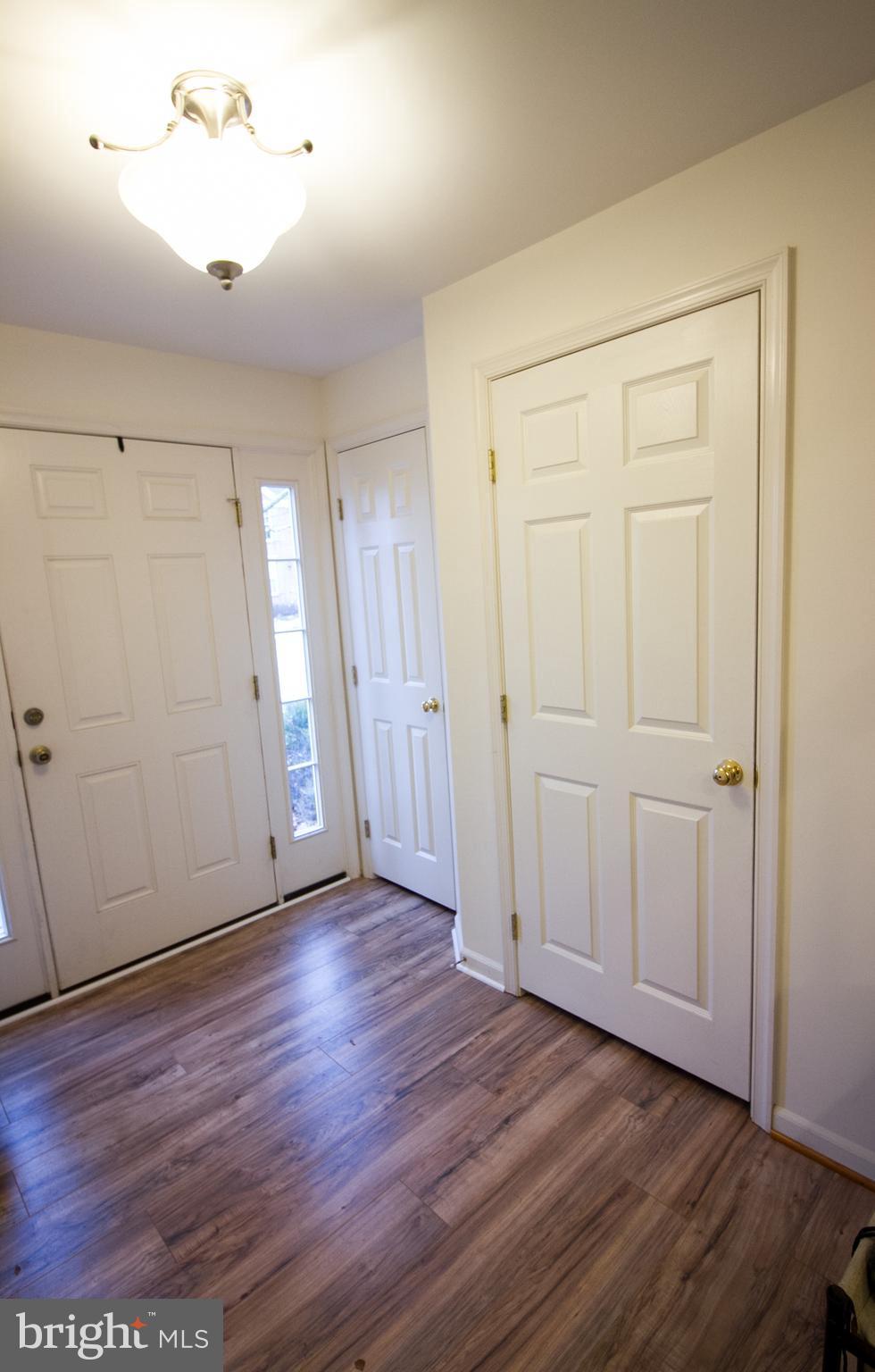 1253 Steed Street Ranson, WV 25438 - Photo 8 of 18 an empty room with wooden floor