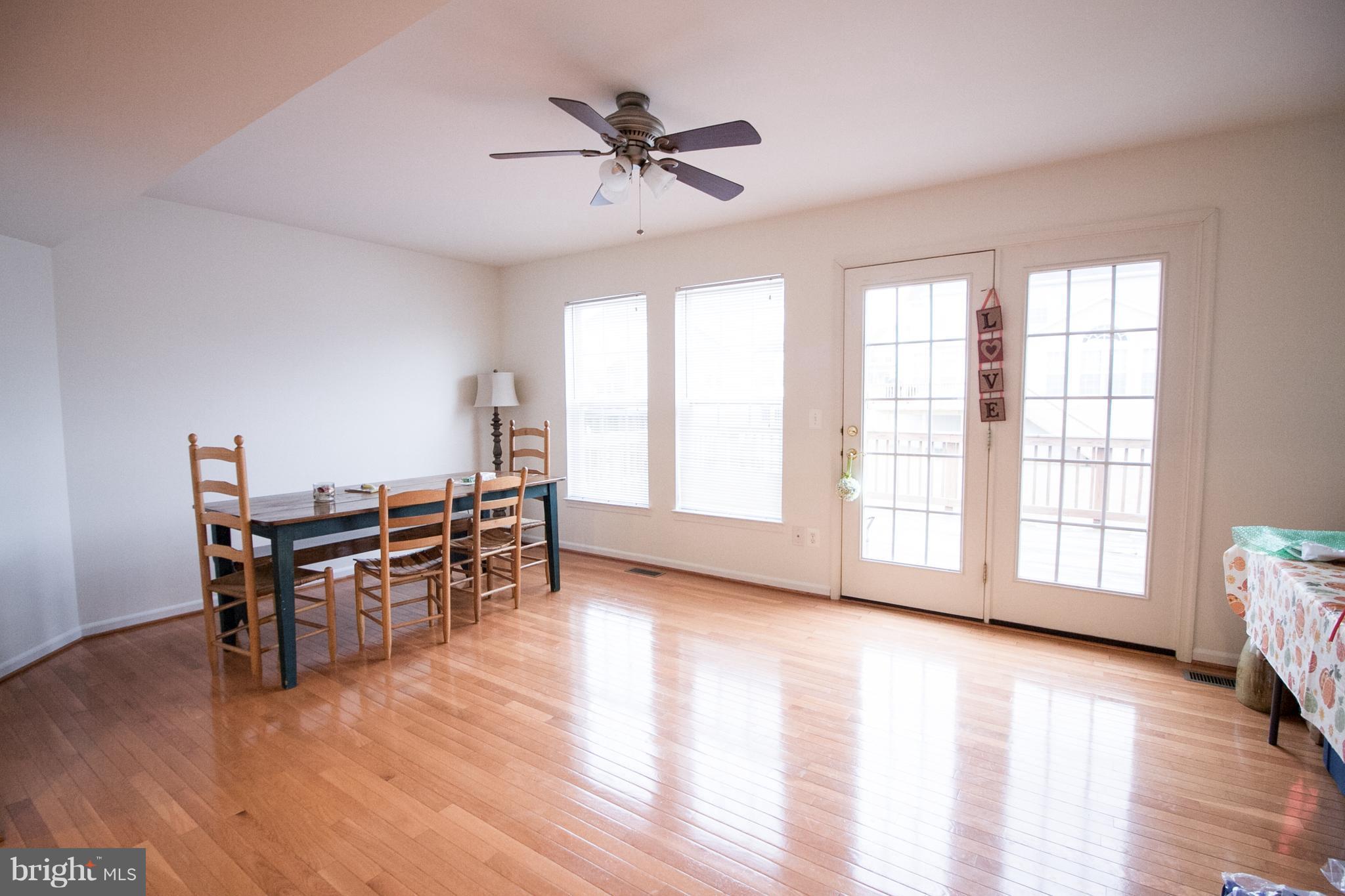 1253 Steed Street Ranson, WV 25438 - Photo 10 of 18 a view of a workspace with furniture and a window