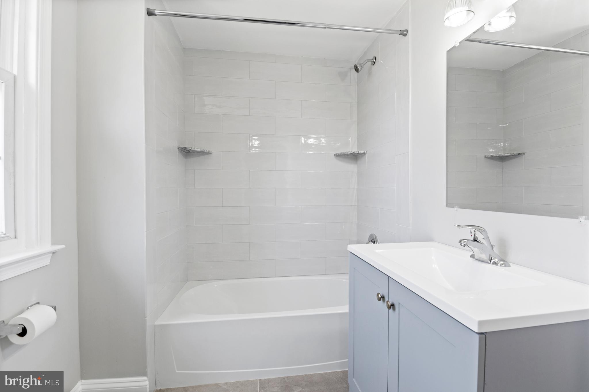 3731 School Lane Newtown Square, PA 19073 - Photo 18 of 31 a bathroom with a bathtub and a sink